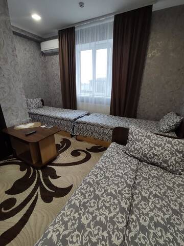 Фото номера Стандартный трехместный номер Отель Караван г. Bila Krynytsya 6