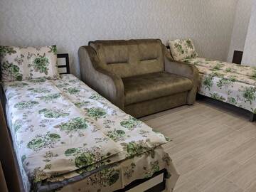 Фото номера Стандартный трехместный номер Отель Караван г. Bila Krynytsya 12